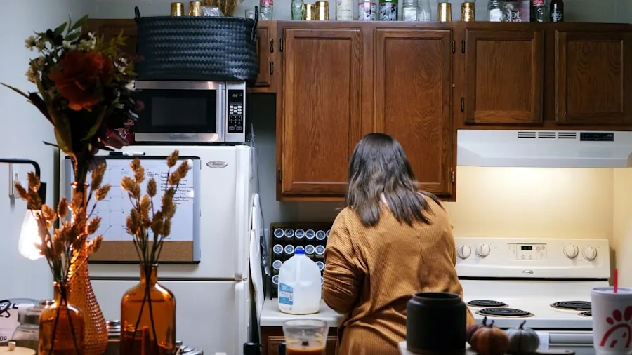 Family of three preparing rice meal in compact kitchen with minimal counter space