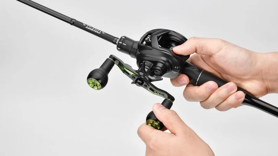 Fisherman's hands gripping spinning rod handle during casting on water