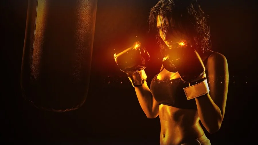 Focused cyclist pedaling intensely on stationary bike during indoor training session