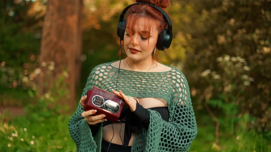 Friends enjoying music together outdoors in natural setting with open landscape