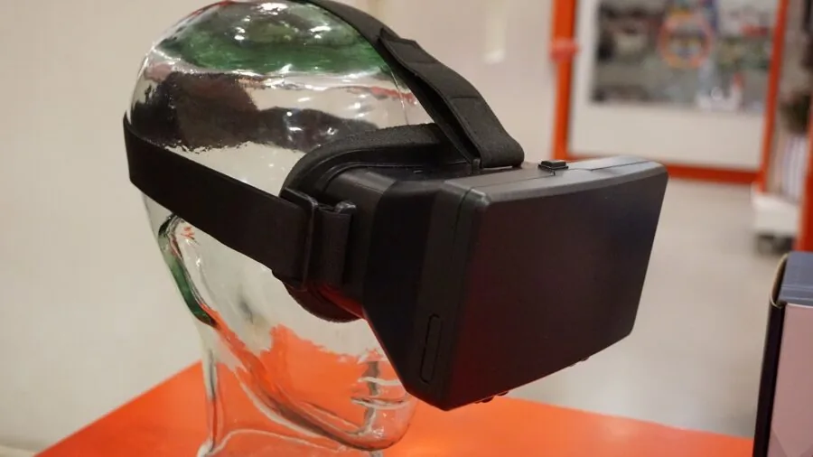 Golfer wearing VR headset experiencing immersive golf simulation indoors