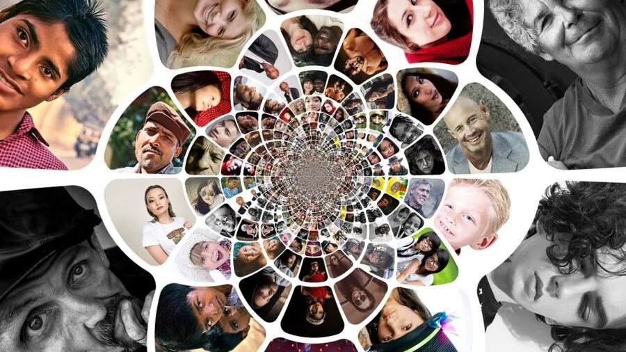 Group of diverse people connecting and collaborating together in a modern shared space