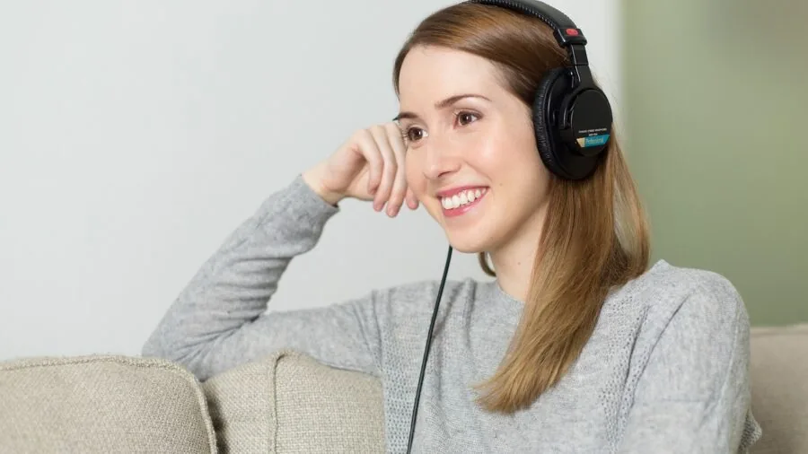 Infant child enjoying gentle music with parent in calm home environment
