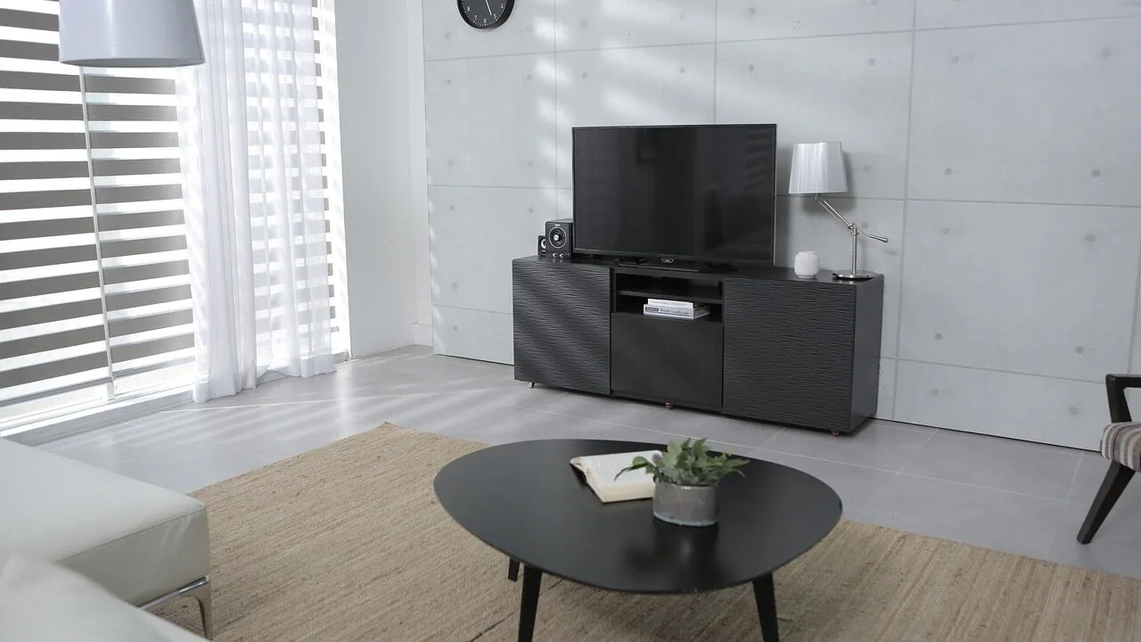 Large 75 inch television displaying content in modern living room setting