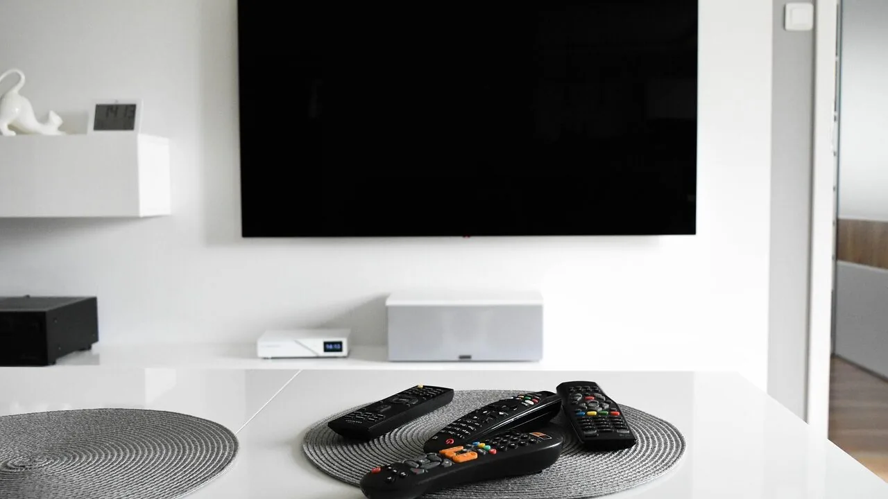 Large 85 inch television mounted on wall in modern living room