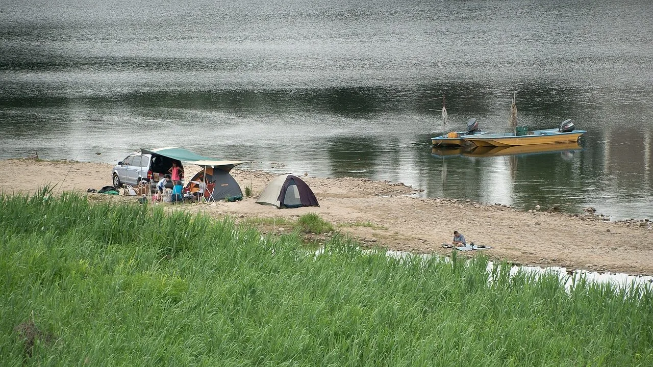 Large family tent set up in outdoor camping area with natural lighting