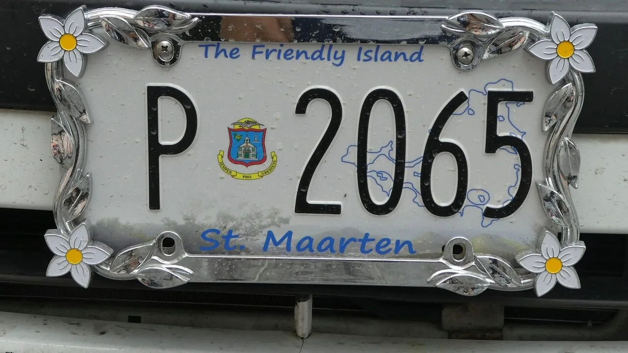License plate frames displayed on vehicle bumper in close-up view