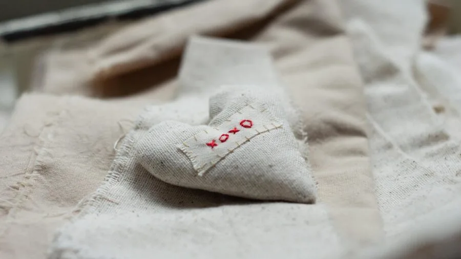 Man feeling luxurious soft fabric material quality for clothing selection