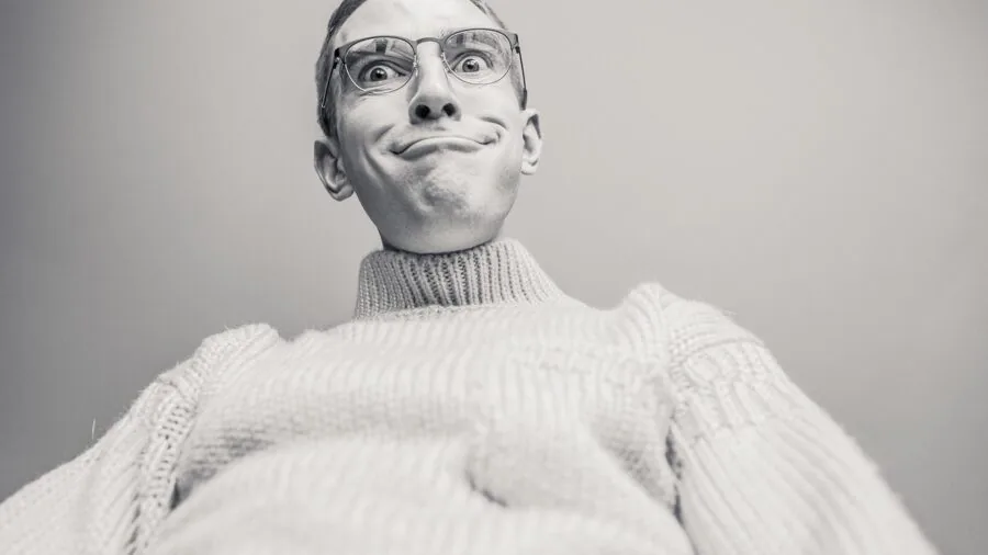 Man in casual cotton sweater demonstrating comfortable layering for everyday wear