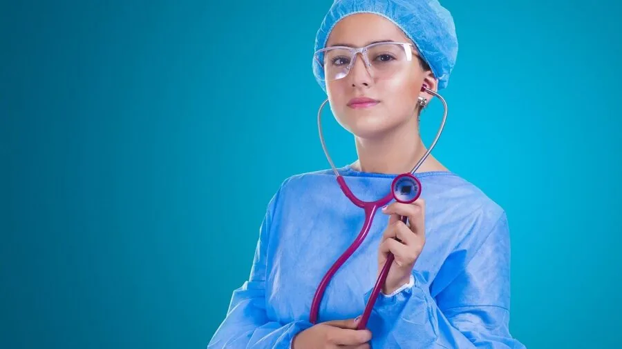 Medical professional examining gloves for quality standards and certification compliance