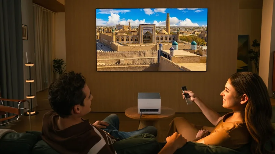 Modern home theater room with comfortable seating and wall-mounted speakers in a residential living space