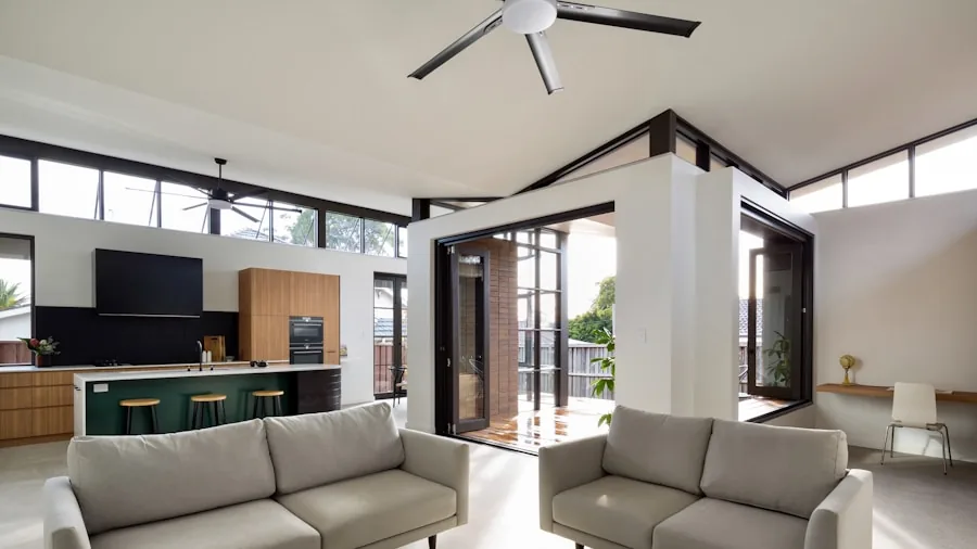 Modern living room with ceiling fan cooling the space during summer months