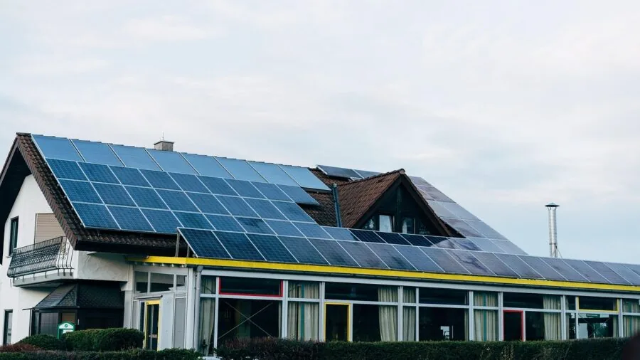 Modern workspace with sustainable energy technology and efficiency monitoring displays