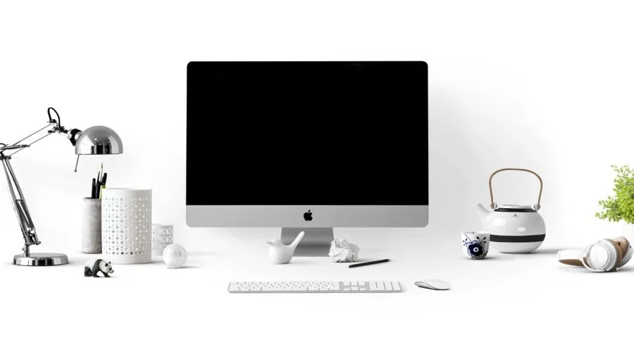 Neatly organized cables and wires managed on a desk with audio equipment setup