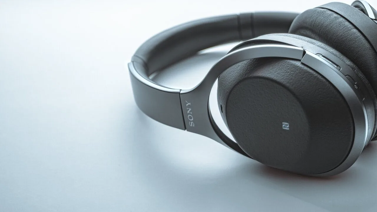 Noise cancelling headphones with ear cups and headband visible in close-up view