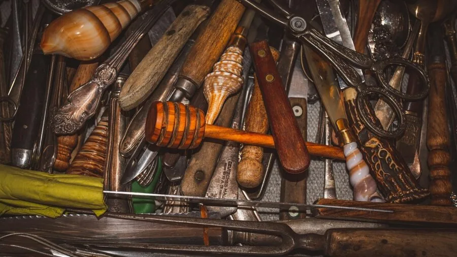 Open kitchen drawer with neatly organized cooking utensils and tools arranged for easy access