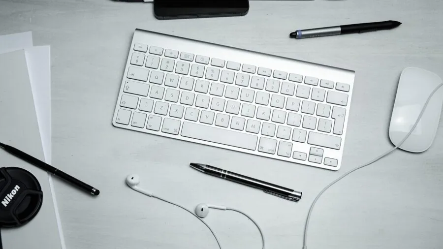 Organized desk workspace with computer cables and connectivity ports visible