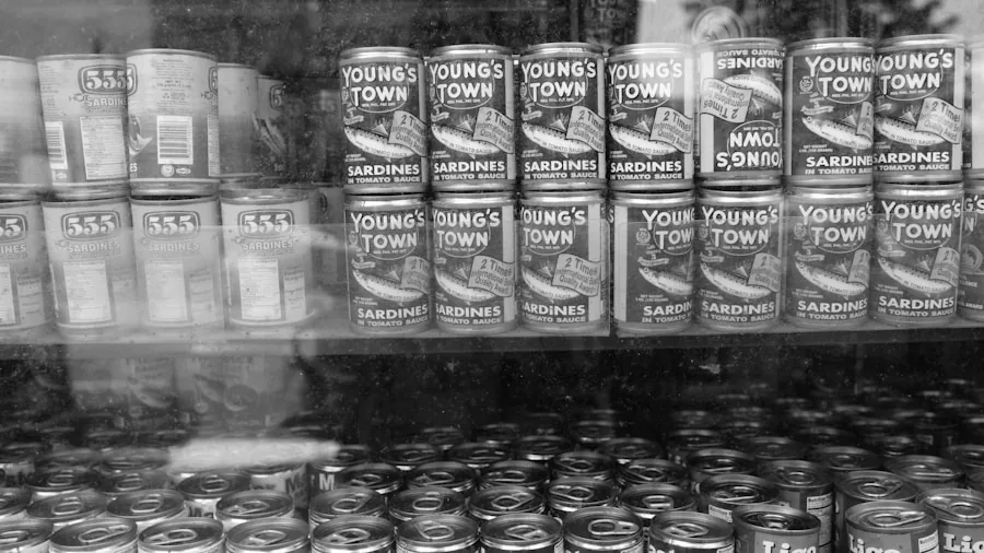 Organized kitchen pantry shelves with various canned vegetables and goods stored in containers