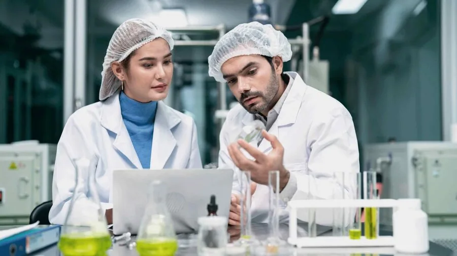 Organized laboratory workspace with stable equipment racks and scientific materials arranged safely
