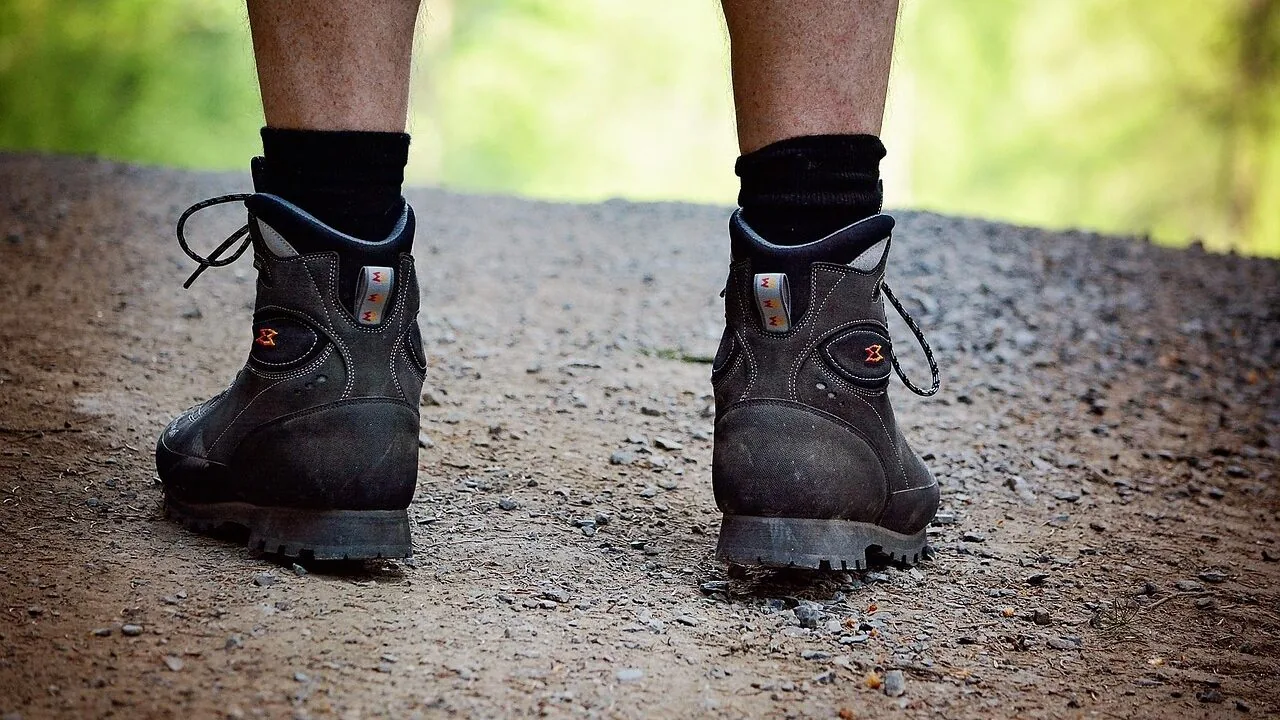 Pair of comfortable men's walking shoes displayed on neutral background