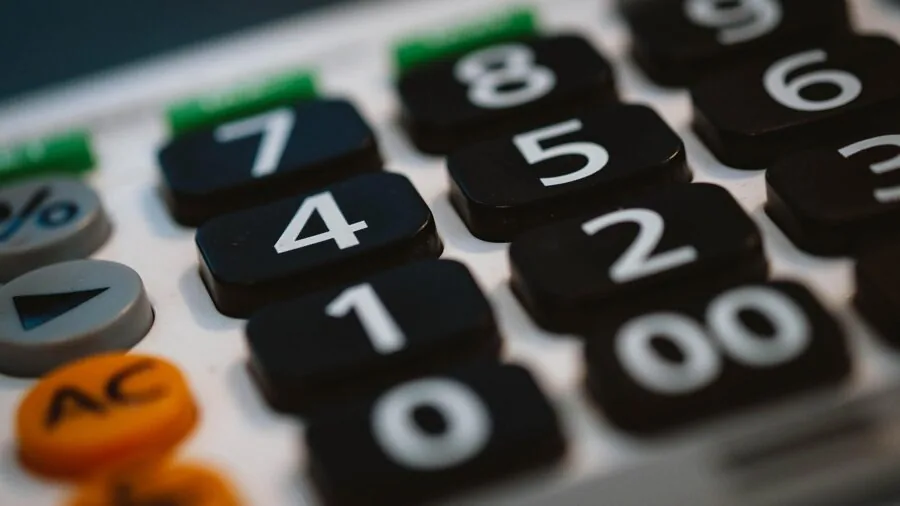 Parents comparing prices and options while planning purchases for their growing family needs
