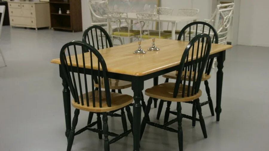 People seated at dining table demonstrating correct chair height and posture during meal