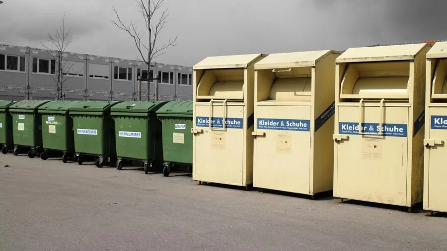 Person assessing household food scraps and organic waste for composting decisions