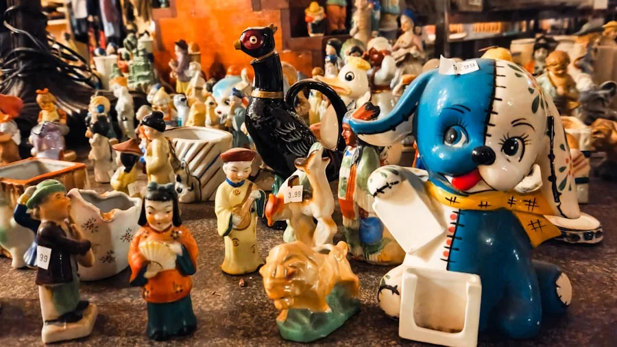 Person carefully cleaning a detailed collectible figurine with a soft brush to remove dust