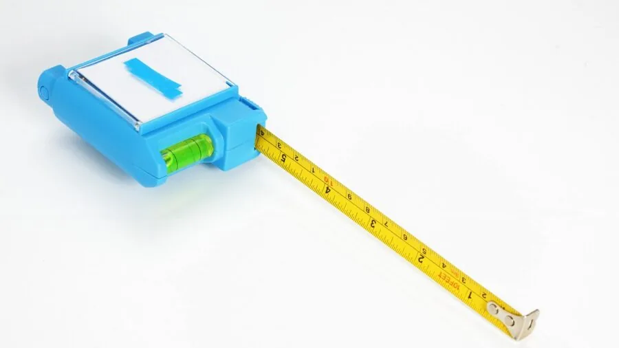 Person carefully measuring an object with precision tools to demonstrate accuracy and attention to detail