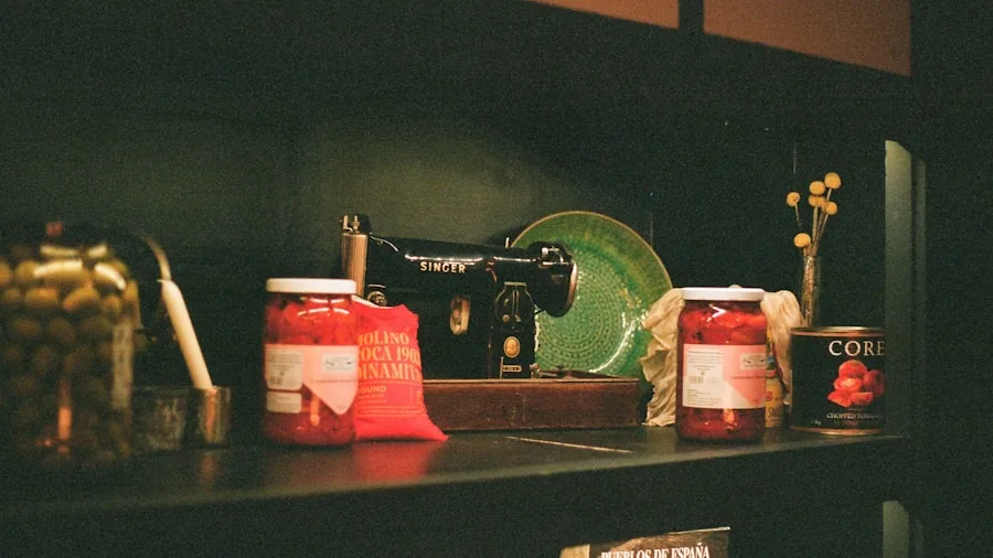 Person carefully opening a can in a bright kitchen, demonstrating safe food preparation techniques