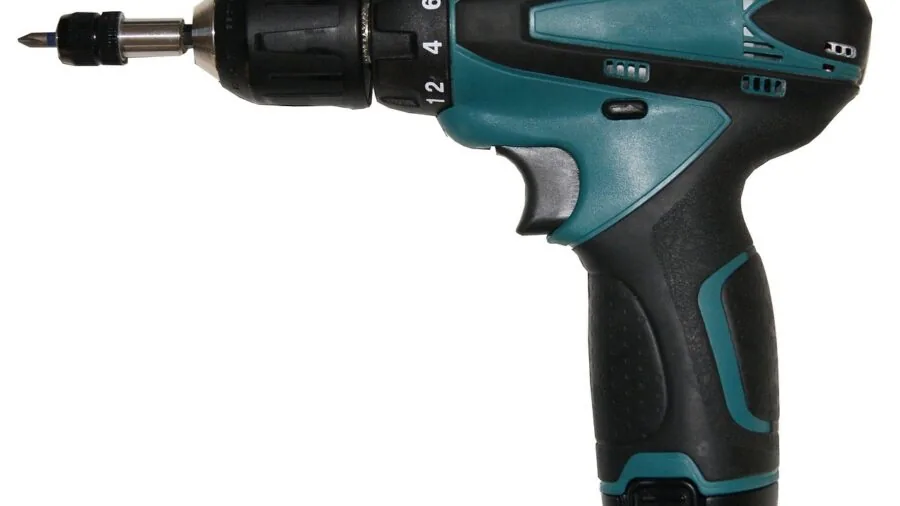 Person comparing different power tool options for yard work decision making