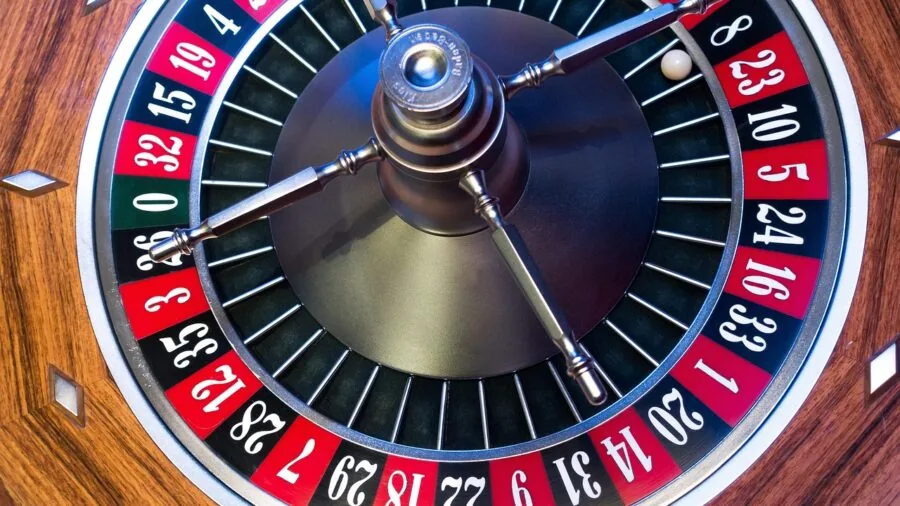 Person designing and customizing colorful prize wheel segments for event planning