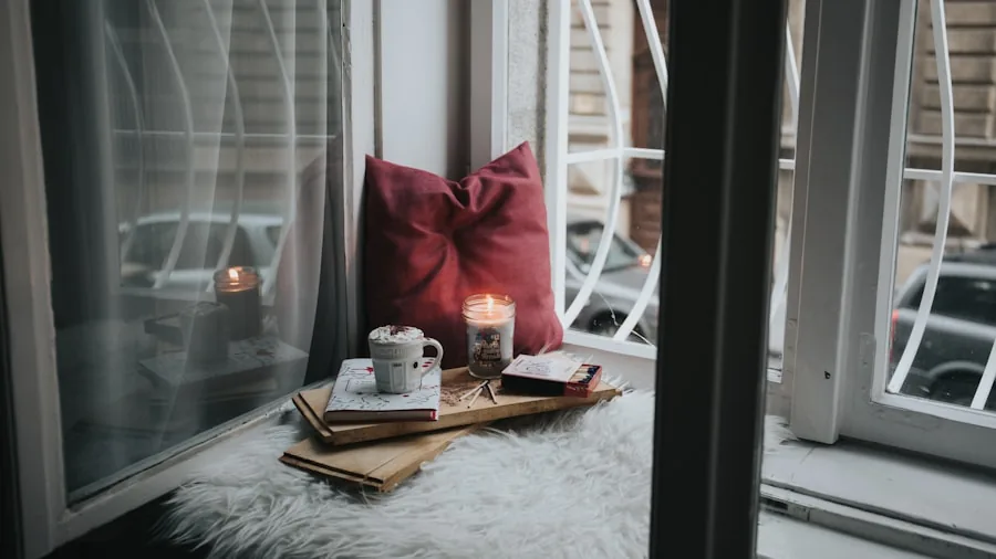 Person enjoying a comfortable, well-made bed with fluffy pillows and soft bedding in natural daylight