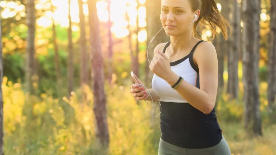 Person enjoying active outdoor lifestyle demonstrating health and wellness through natural movement and exercise