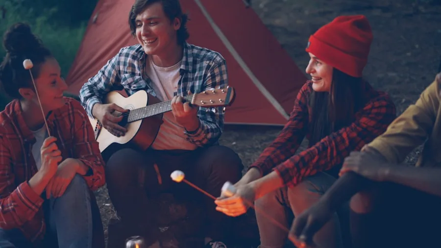 Person enjoying entertainment setup inside RV or camper during outdoor adventure trip