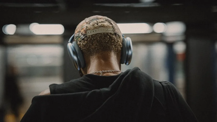 Person enjoying music during daily commute on public transportation
