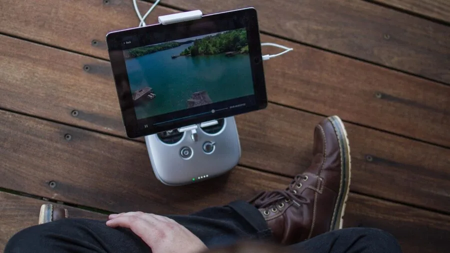 Person enjoying video content on tablet in landscape orientation