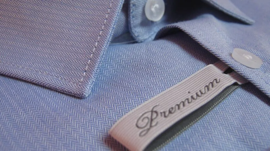 Person evaluating and comparing product features and build quality for informed purchasing decision