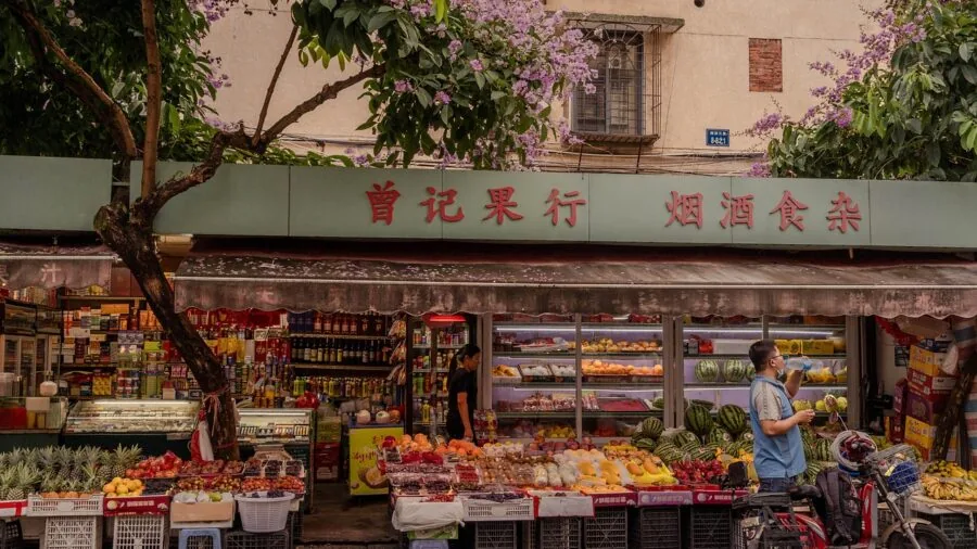 Person evaluating different product options while shopping, comparing value and price considerations