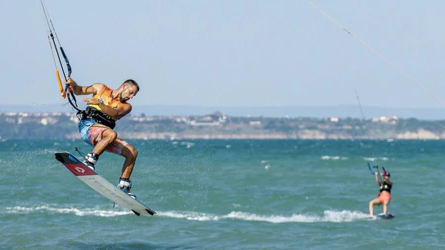 Person examining stand-up paddleboard dimensions and specifications before purchase