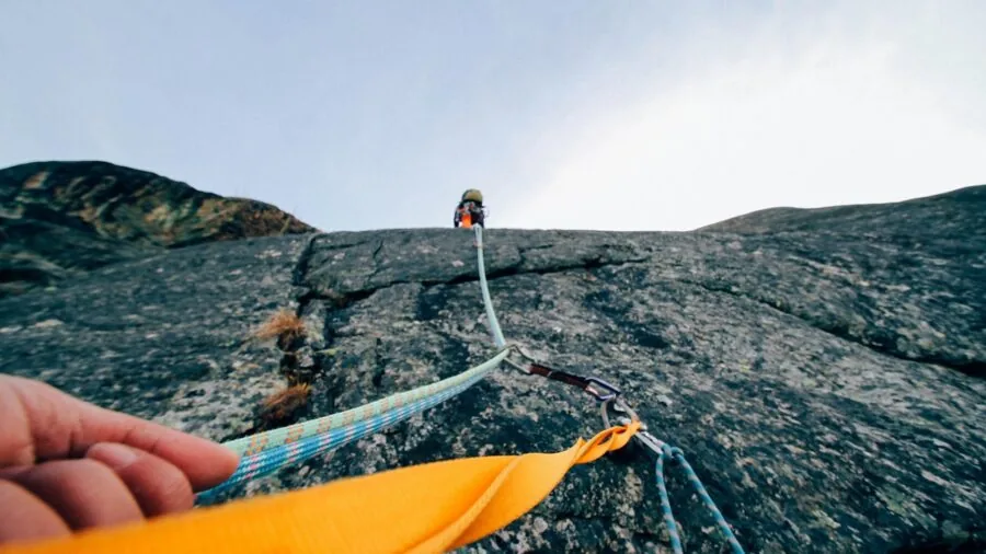Person filming outdoor adventure with mounted camera from fixed angle perspective
