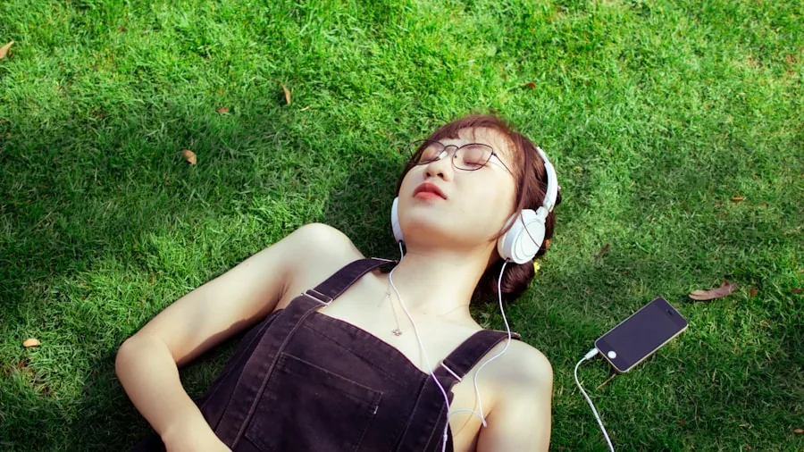 Person immersed in music with eyes closed, feeling deep bass and sound quality in a living room