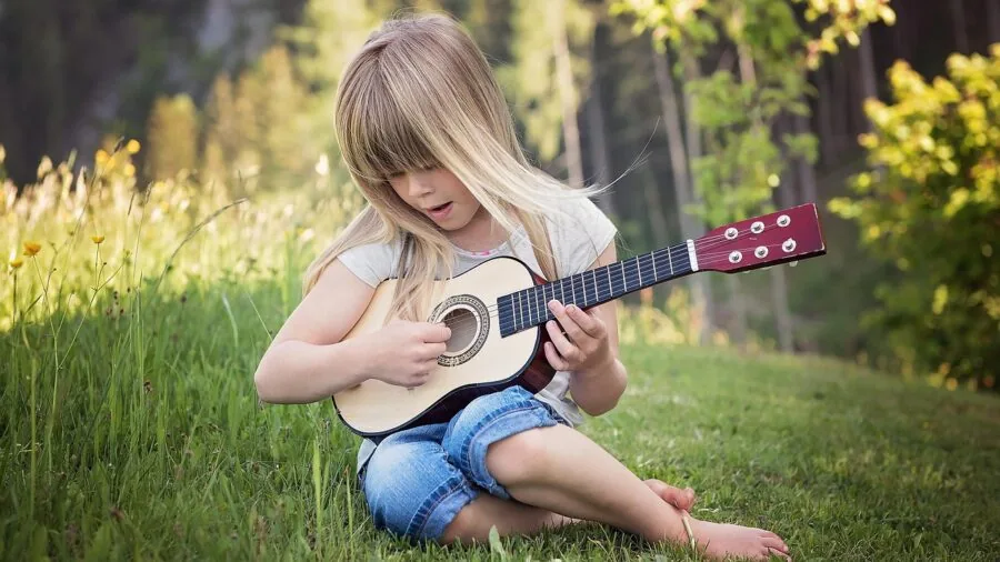 Person listening to music outdoors with headphones, representing accessible audio quality across different budgets