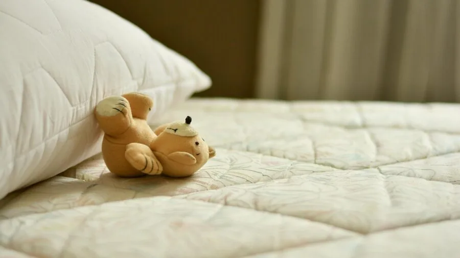 Person lying on mattress during trial period evaluating comfort and sleep quality