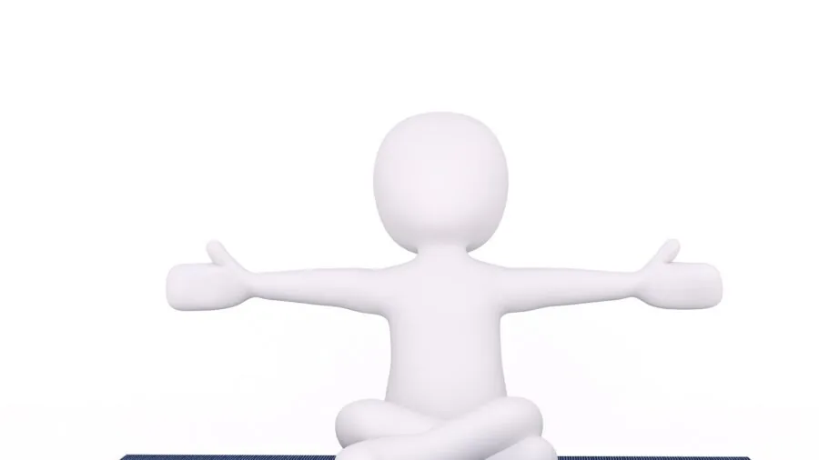 Person practicing yoga on mat in spacious studio with full body extension during standing pose