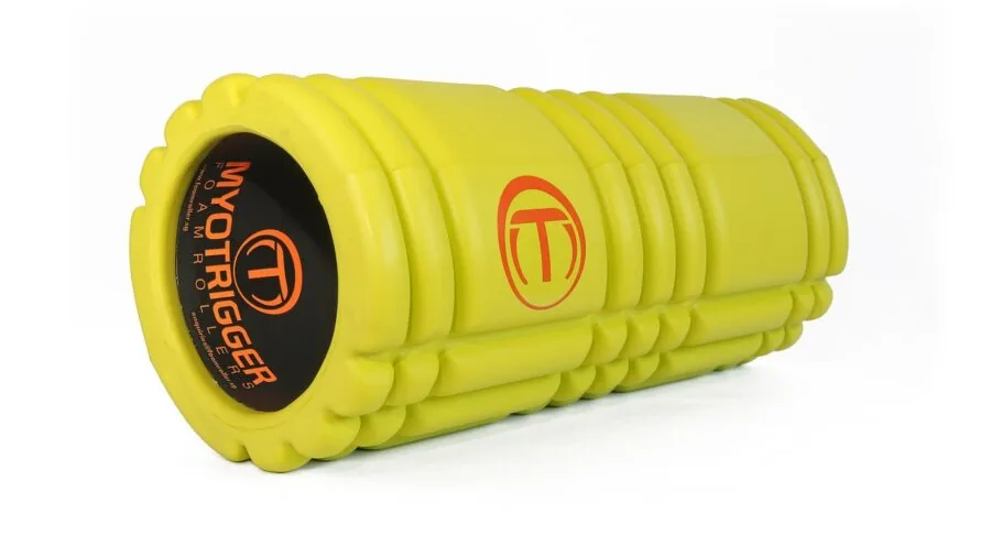 Person rolling out leg muscles on foam roller during home workout session