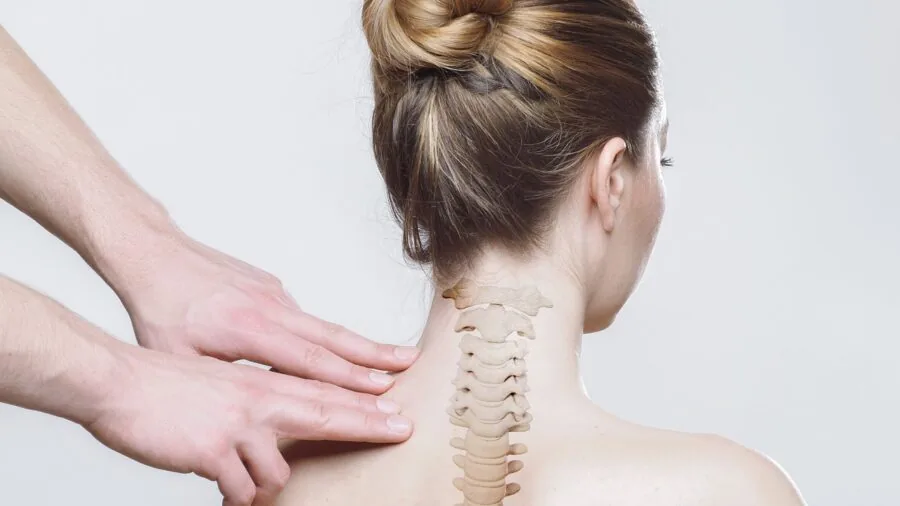 Person sleeping peacefully on pillow with proper neck and spine alignment