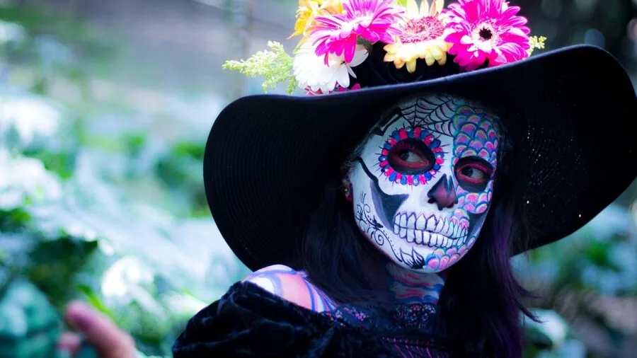 Person touching face during daily activities, showing makeup wear and real-world conditions