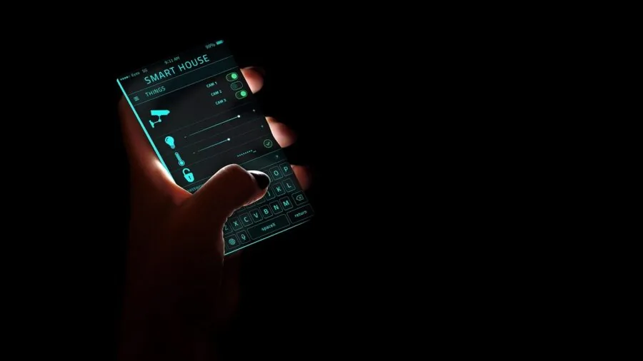 Person using smartphone app to control smart home cleaning technology from living room