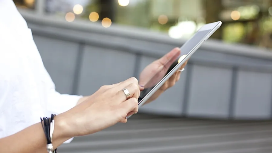 Person using tablet for work or learning in a comfortable home environment